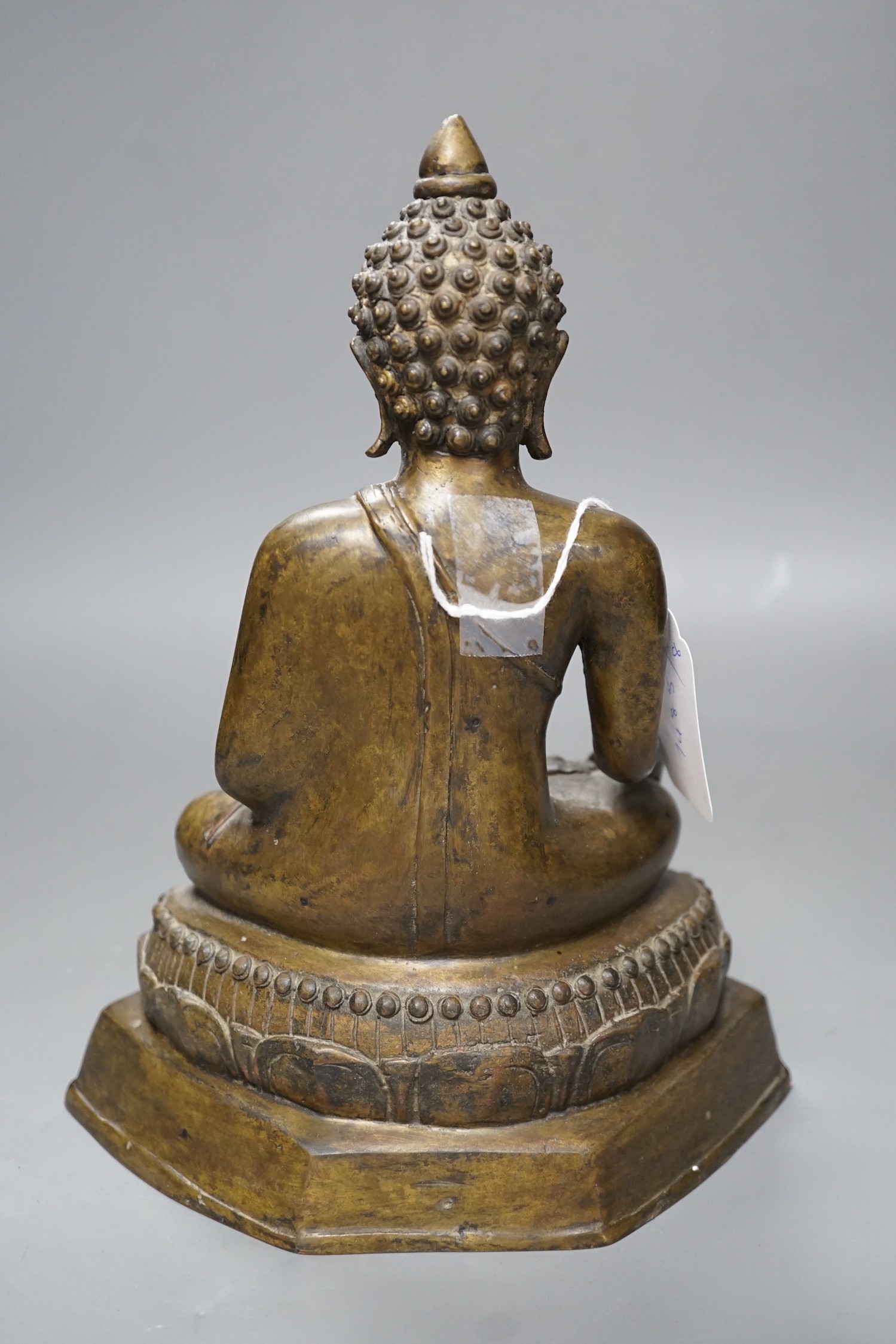 A Himalayan bronze figure of Buddha Shakyamuni, 25cm